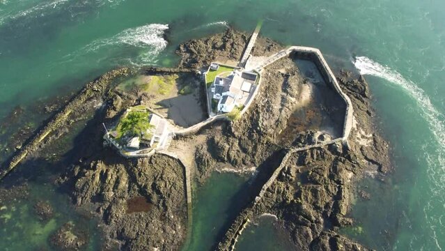 Whitebait island landmark on Welsh Swellies river private secluded cottages aerial Birdseye pull back view