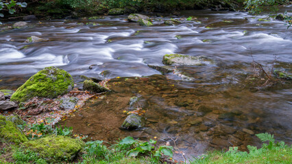 View of fast flowing water in the East Lyn River