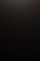 The white cement wall was in the dark and had a faint light.