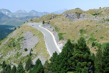 Layered mountain landscape with drive down in the french side of Pyrenees mountain range
