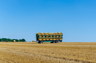 Rolled up bales of hay ready for transportation
