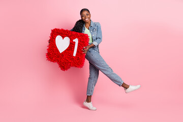 Full size photo of good mood laughing girl dancing wear casual denim style hold like icon isolated on pink color background