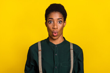 Fototapeta premium Portrait of attractive amazed classy woman sudden news reaction pout lips isolated over bright yellow color background