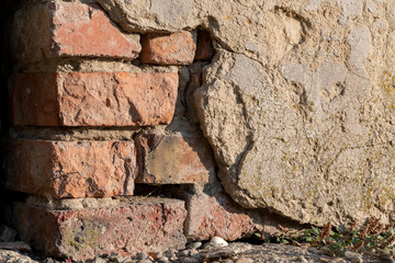 old brick wall with cracks
