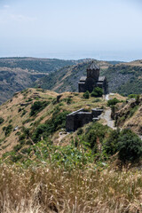 ancient stone dilapidated fortress in a picturesque place in the mountains of Armenia