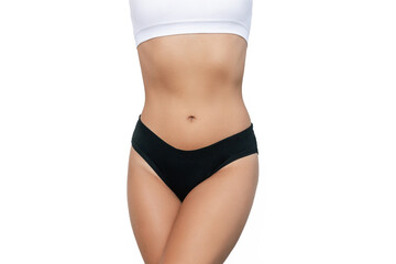 Cropped shot of young fit woman in black panties with slender toned figure isolated on white background. Result of fitness, diet, healthy lifestyle. Female perfect body. Beauty concept