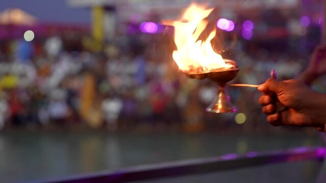 Performing ganga aarti with a lamp haridwar