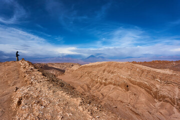 hiker in the chile desert in san pedro de atacama