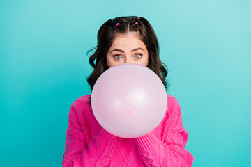 Closeup photo of young beautiful lady attractive prepare birthday cap head hide half face big balloon blowing air isolated on cyan color background