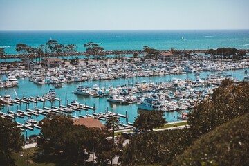 Dana Point summit, a view of the harbor full of ships and boats in California - obrazy, fototapety, plakaty