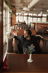 A stylish portrait of a charismatic man in the city 