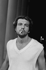 Fototapeta premium A stylish portrait of a charismatic man in the city 