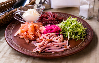 traditional Belarusian salad of vegetables and bacon. salad Paparats kvetka