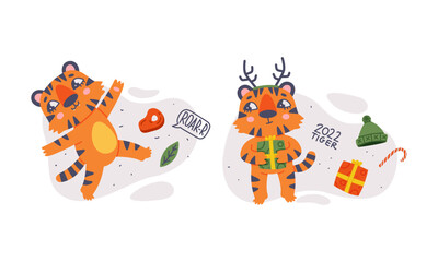 Naklejka premium Cute baby tigers set celebrating New Year. Funny orange striped jungle wildcat characters cartoon vector illustration