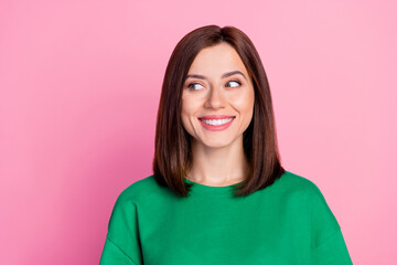 Fototapeta premium Closeup photo of young beautiful cute lady looking empty space smiling advertisement isolated on pink color background