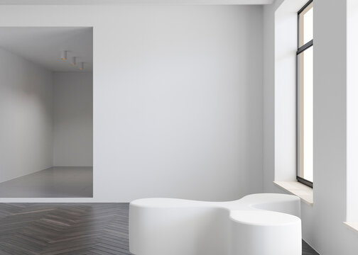 Empty white wall in modern art gallery. Mock up interior in minimalist style. Free, copy space for your artwork, picture, text, or another design. Empty exhibition space. 3D rendering.