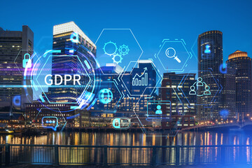 City view panorama of Boston Harbour and Seaport Blvd at night time, Massachusetts. Building exteriors of financial downtown. GDPR hologram is data protection regulation, privacy for all individuals
