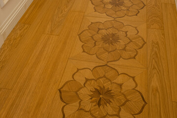 Beautiful parquet board with a flower pattern, parquet floor