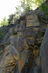 A large stone wall that stretches to the sky