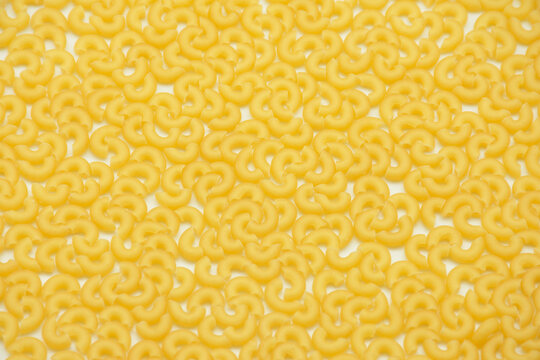 Italian pasta closeup picture.Raw pasta .Top view of Italian cuisine ingredient.