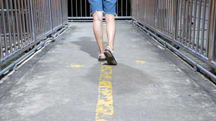 People walking on the overpass