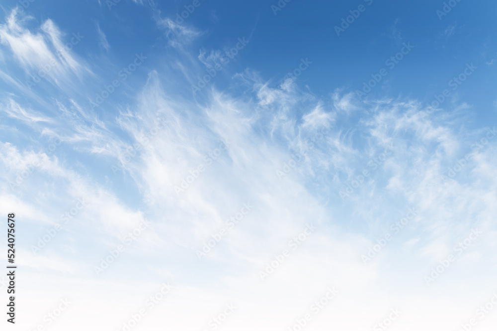 Wall mural beautiful fluffy abstract clouds on cyan and white sky background gradient, blue heaven backdrop in 