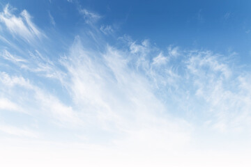 Beautiful fluffy abstract clouds on cyan and white sky background gradient, blue heaven backdrop in...
