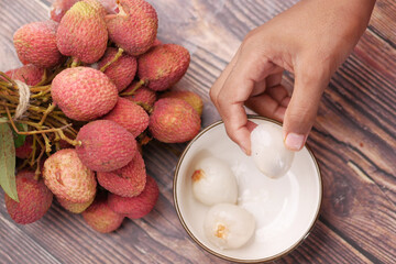 taking skin off a Lychee top down.