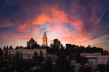 Fototapeta premium Colorful sunset view of Mount Zion and the St. James Cathedral in the Armenian Quarter of Jerusalem's Old City.