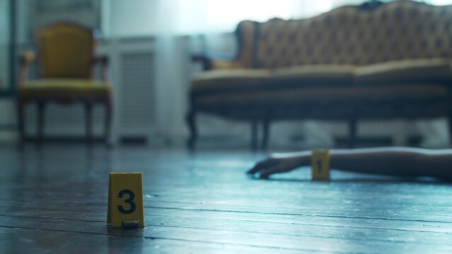 Closeup Of A Crime Scene In A Deceased Person's Home. Dead Man, Police Line, Clues And Evidence. Serial Killer And Detective Investigation Concept.