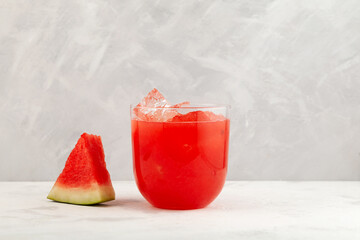 Watermelon agua fresca. Glass of Refreshing summer drink. Red punch with fresh watermelon juice....