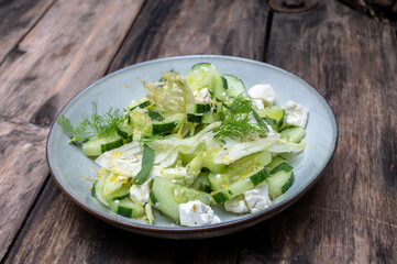 A plate of cuncumber salad