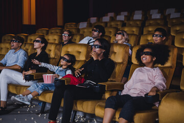 Group of Caucasian white and African audiences  enjoying a 3D movie.