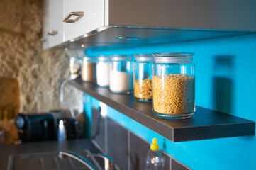 Some pasta in a glass pot in a kitchen