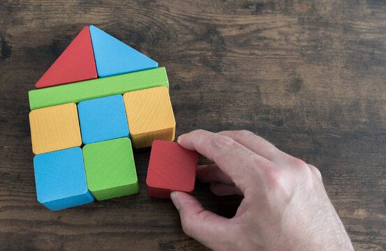 Building House With Wooden Toy Blocks, Real Estate Concept