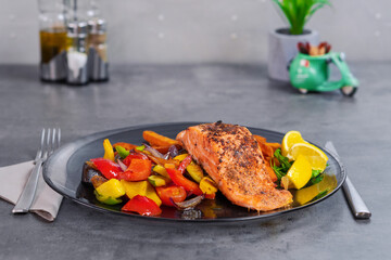 Fresh Roasted Vegetables And Roasted Salmon With Gray Background