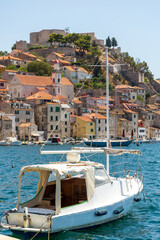 Sibenik, Croatia, a small sea vessel is moored off the coast