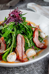 Smoked duck breast salad with vegetables and spices