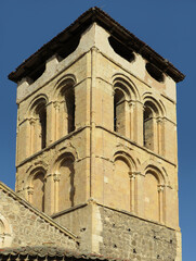 Fototapeta premium Romanesque church of Santos Justo and Pastor. (12th century). Detail of the bell tower. Historic city of Segovia. Spain. 