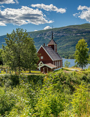 Wooden church by the lake in Norway
