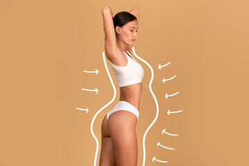Fototapeta Liposuction concept. Drawn outlines with arrows around fit lady in white underwear, slender woman with perfect figure obraz