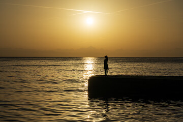 silhouette of a person on the beach
