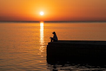 Sitting there watching the sunrise.