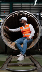 Fototapeta na wymiar Chief Engineer of the Mechanical Plant Conduct inspection of the sterilization machine tunnel. To check the working condition of the machine to be ready