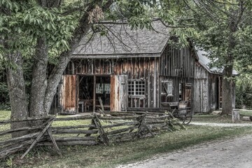 Fototapeta na wymiar old carpenter shop barn Lang Century village Keene Ontario