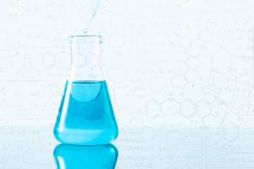 blue science test tube on white background,Laboratory glassware with colorful liquids on white...
