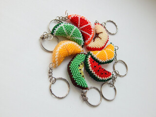 Bead colorful key chains on a white background