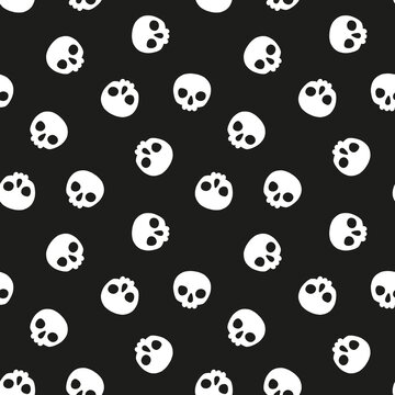 Black seamless pattern with white Halloween skulls