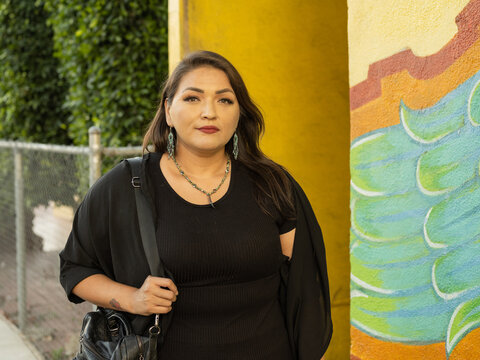 Native teacher looking into the camera in a horizontal close up image