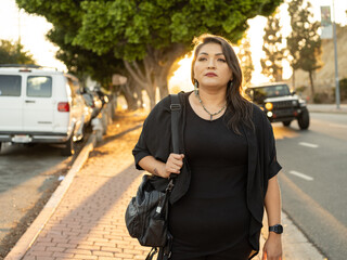Fototapeta premium Native woman walking to work